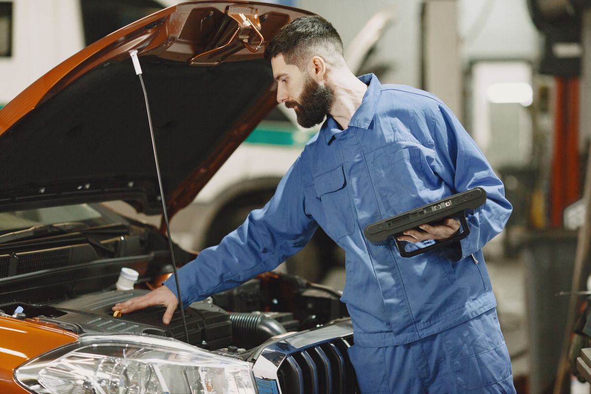 Mechanic working in an auto repair garage